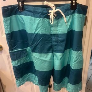 Old Navy Mens 10” Board Shorts at the knee.